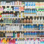 assorted drinks on white commercial refrigerator